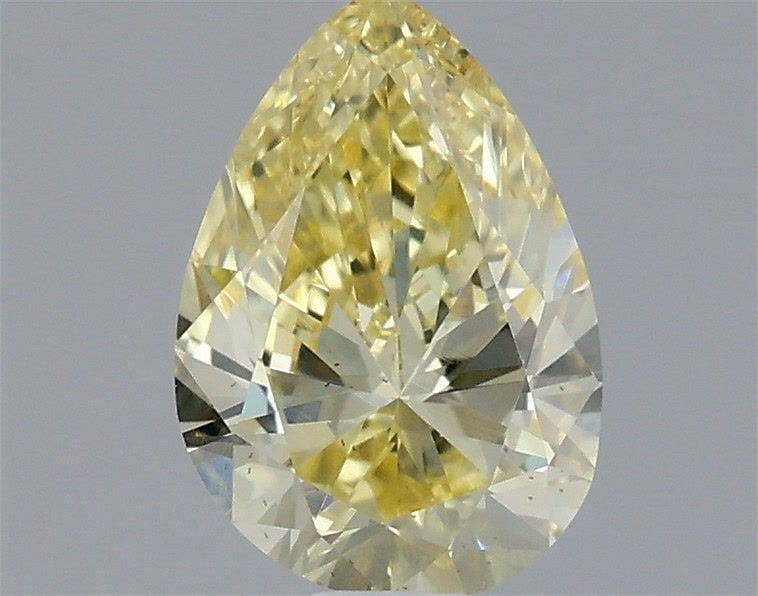 Loose Diamond - PEAR 0.65ct Fancy Yellow VS2: Loose Diamond - PEAR 0.65ct Fancy Yellow VS2 Source: This is a real non-mined Diamond that has been grown in a lab Shape: PEAR Carats: 0.65 Color: Fancy Yellow Certification: IGI Video: