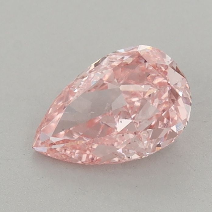 Loose Diamond - PEAR 0.91ct Fancy Vivid Pink VS1: Loose Diamond - PEAR 0.91ct Fancy Vivid Pink VS1 Source: This is a real non-mined Diamond that has been grown in a lab Shape: PEAR Carats: 0.91 Color: Fancy Vivid Pink Certification: IGI Video: