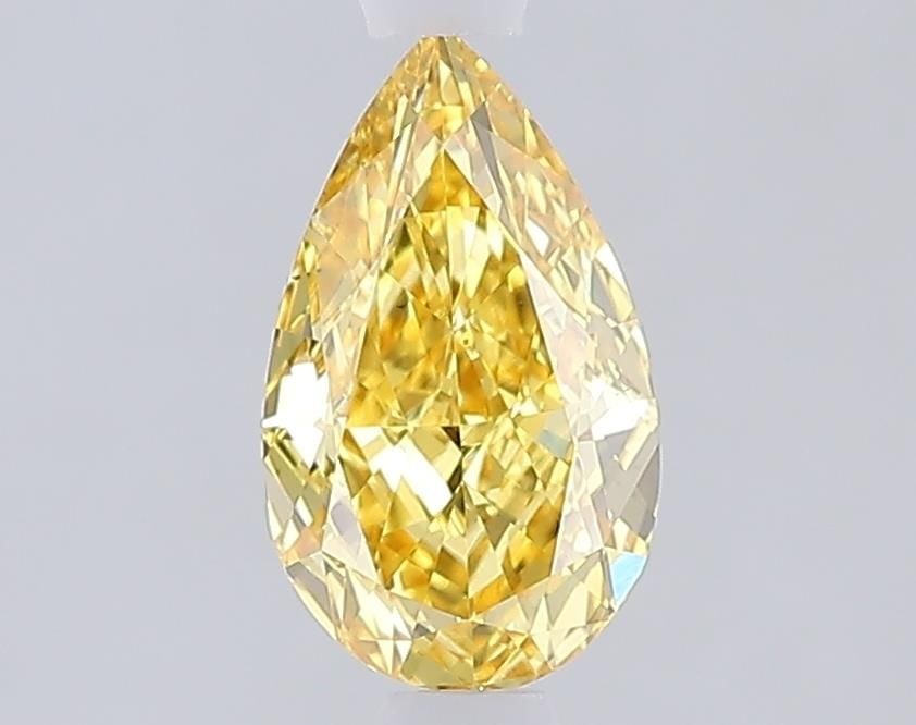 Loose Diamond - PEAR 1.03ct Fancy Vivid Yellow VS2: Loose Diamond - PEAR 1.03ct Fancy Vivid Yellow VS2 Source: This is a real non-mined Diamond that has been grown in a lab Shape: PEAR Carats: 1.03 Color: Fancy Vivid Yellow Certification: IGI Video: