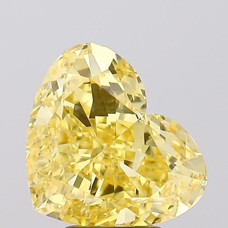 Loose Diamond - HEART 5.03ct Fancy Vivid Yellow VVS2: Loose Diamond - HEART 5.03ct Fancy Vivid Yellow VVS2 Source: This is a real non-mined Diamond that has been grown in a lab Shape: HEART Carats: 5.03 Color: Fancy Vivid Yellow Certification: IGI Video:
