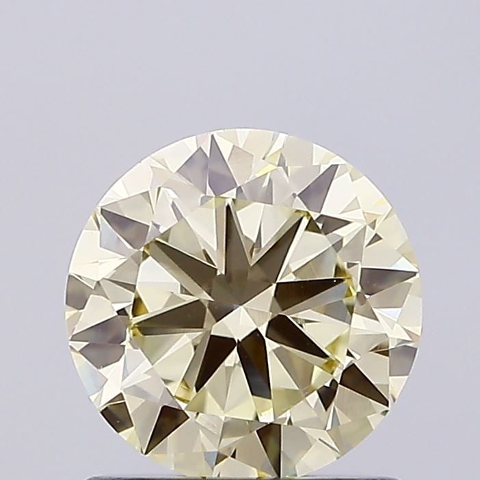 Loose Diamond - ROUND 1.02ct Fancy Light Yellow VS1: Loose Diamond - ROUND 1.02ct Fancy Light Yellow VS1 Source: This is a real non-mined Diamond that has been grown in a lab Shape: ROUND Carats: 1.02 Color: Fancy Light Yellow Certification: IGI Video:
