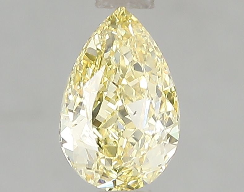 Loose Diamond - PEAR 1.06ct Fancy Intense Yellow VS2: Loose Diamond - PEAR 1.06ct Fancy Intense Yellow VS2 Source: This is a real non-mined Diamond that has been grown in a lab Shape: PEAR Carats: 1.06 Color: Fancy Intense Yellow Certification: IGI