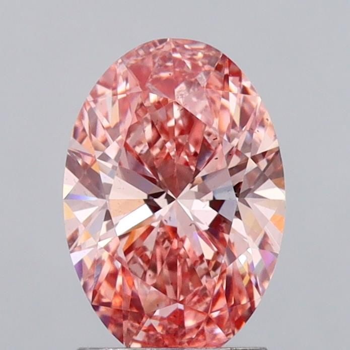 Loose Diamond - OVAL 1.99ct Fancy Vivid Pink VS2: Loose Diamond - OVAL 1.99ct Fancy Vivid Pink VS2 Source: This is a real non-mined Diamond that has been grown in a lab Shape: OVAL Carats: 1.99 Color: Fancy Vivid Pink Certification: IGI Video: