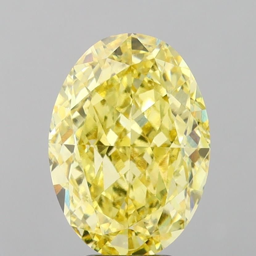 Loose Diamond - OVAL 7.1ct Fancy Intense Yellow VVS2: Loose Diamond - OVAL 7.1ct Fancy Intense Yellow VVS2 Source: This is a real non-mined Diamond that has been grown in a lab Shape: OVAL Carats: 7.1 Color: Fancy Intense Yellow Certification: IGI Video: