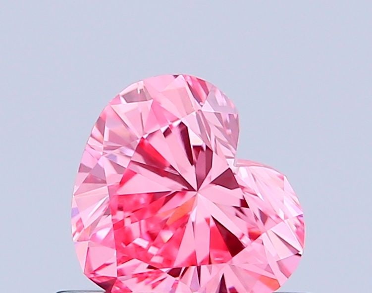 Loose Diamond - HEART 0.47ct Fancy Vivid Pink VS1: Loose Diamond - HEART 0.47ct Fancy Vivid Pink VS1 Source: This is a real non-mined Diamond that has been grown in a lab Shape: HEART Carats: 0.47 Color: Fancy Vivid Pink Certification: IGI Video: