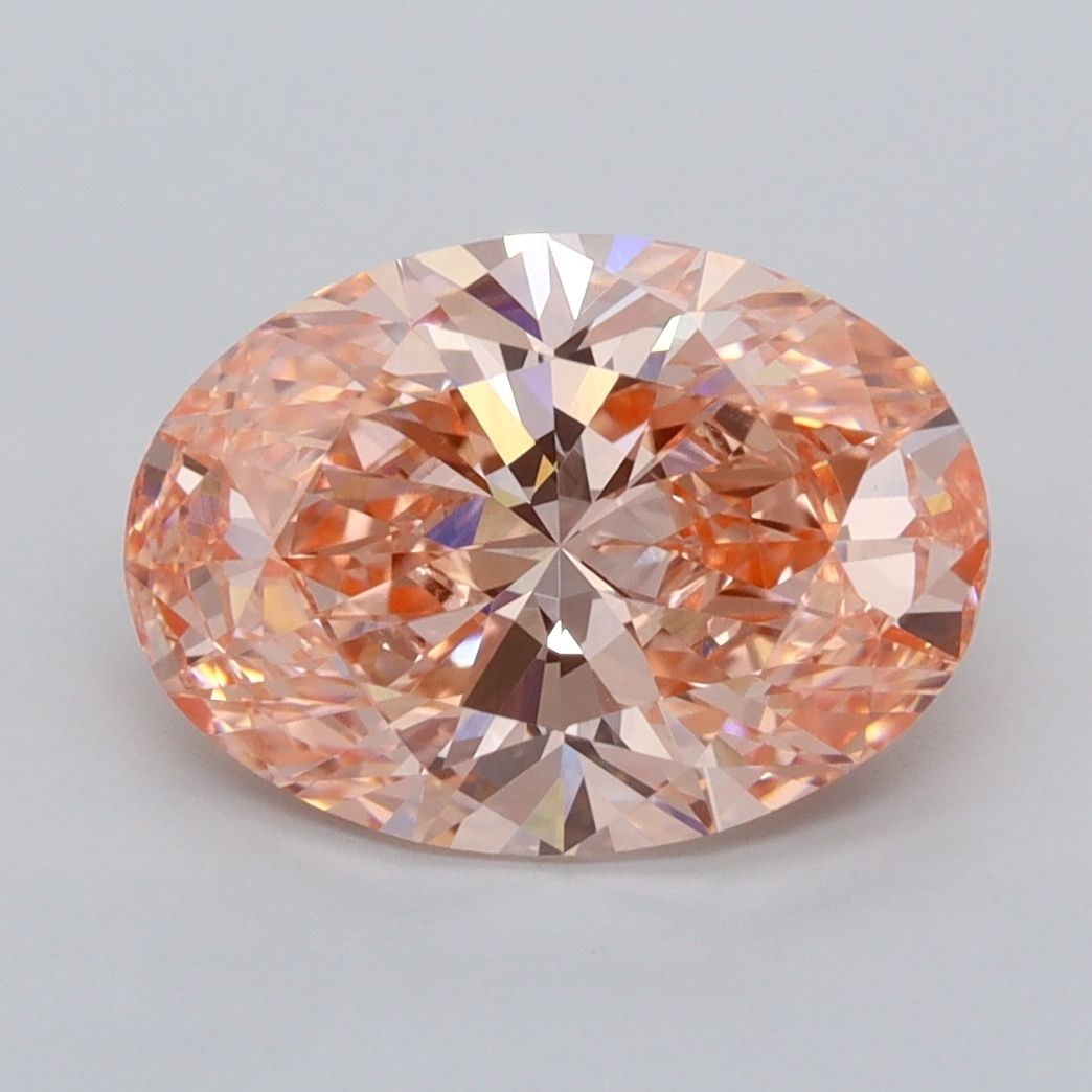 Loose Diamond - OVAL 3.04ct Fancy Vivid Orangey Pink VVS2: Loose Diamond - OVAL 3.04ct Fancy Vivid Orangey Pink VVS2 Source: This is a real non-mined Diamond that has been grown in a lab Shape: OVAL Carats: 3.04 Color: Fancy Vivid Orangey Pink Certification: 