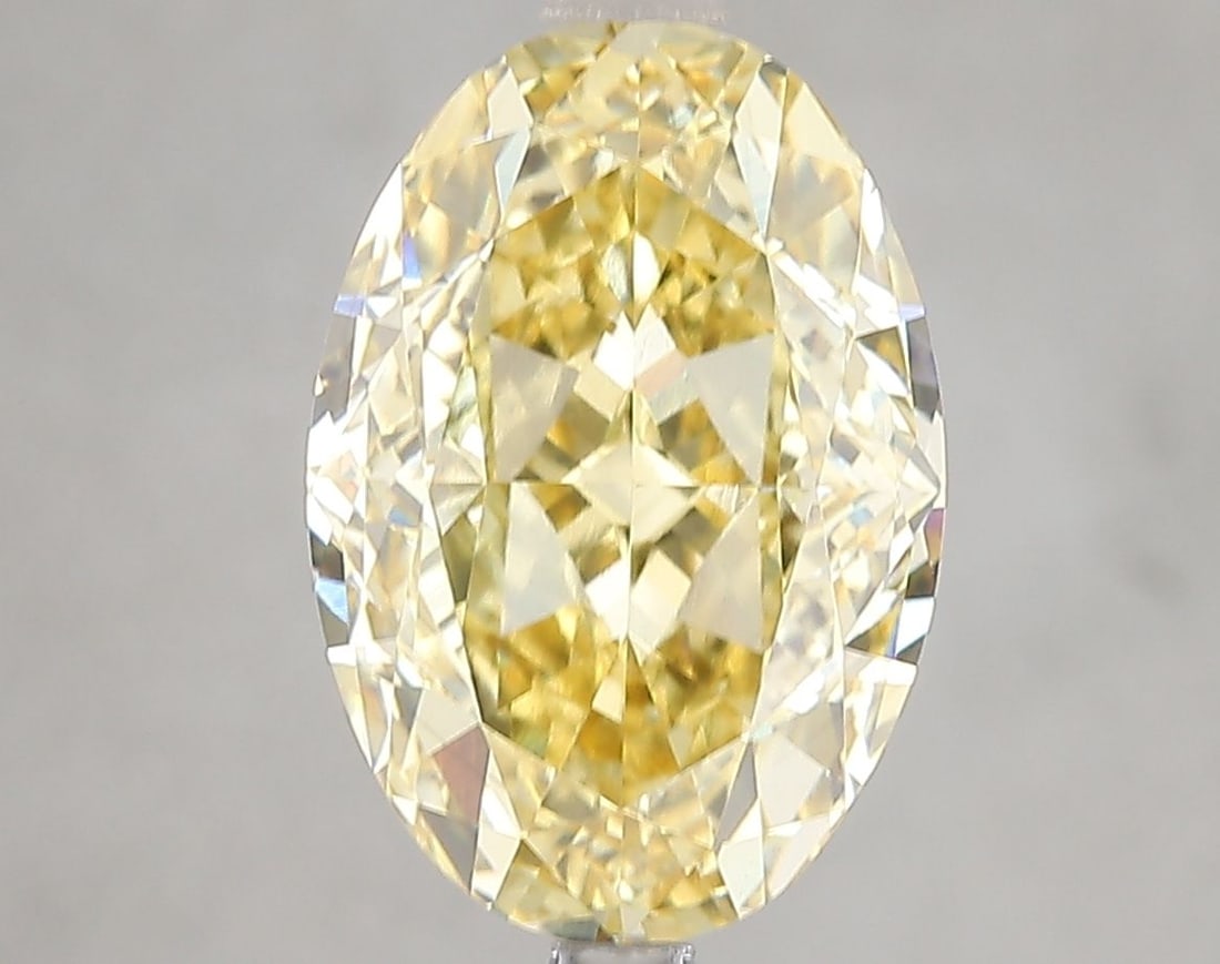 Loose Diamond - OVAL 5.16ct Fancy Intense Yellow VS1: Loose Diamond - OVAL 5.16ct Fancy Intense Yellow VS1 Source: This is a real non-mined Diamond that has been grown in a lab Shape: OVAL Carats: 5.16 Color: Fancy Intense Yellow Certification: IGI Video