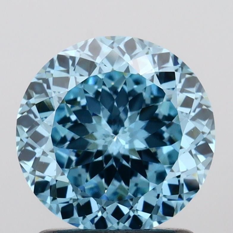 Loose Diamond - ROUND 1.44ct Fancy Vivid Blue VVS2: Loose Diamond - ROUND 1.44ct Fancy Vivid Blue VVS2 Source: This is a real non-mined Diamond that has been grown in a lab Shape: ROUND Carats: 1.44 Color: Fancy Vivid Blue Certification: IGI Video: