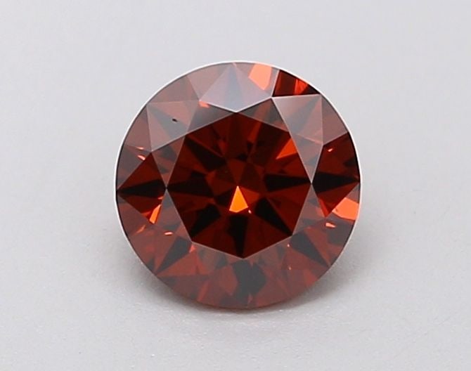 Ideal Loose Diamond - ROUND 0.61ct Fancy Deep Orange VS1: Ideal Loose Diamond - ROUND 0.61ct Fancy Deep Orange VS1 Source: This is a real non-mined Diamond that has been grown in a lab Shape: ROUND Carats: 0.61 Color: Fancy Deep Orange Certification: IGI Vid