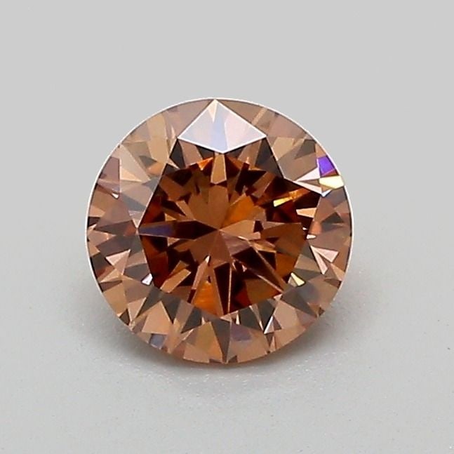 Loose Diamond - ROUND 0.56ct Fancy Brown VS2: Loose Diamond - ROUND 0.56ct Fancy Brown VS2 Source: This is a real non-mined Diamond that has been grown in a lab Shape: ROUND Carats: 0.56 Color: Fancy Brown Certification: IGI Video: