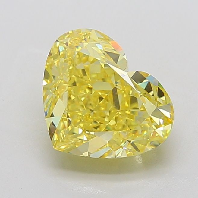 Loose Diamond - HEART 5.1ct Fancy Vivid Yellow VS1: Loose Diamond - HEART 5.1ct Fancy Vivid Yellow VS1 Source: This is a real non-mined Diamond that has been grown in a lab Shape: HEART Carats: 5.1 Color: Fancy Vivid Yellow Certification: IGI The Diamo
