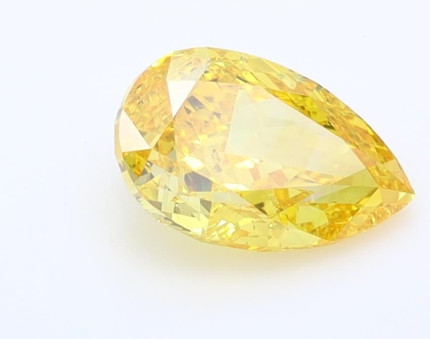 Loose Diamond - PEAR 1.5ct Fancy Vivid Yellow VS2: Loose Diamond - PEAR 1.5ct Fancy Vivid Yellow VS2 Source: This is a real non-mined Diamond that has been grown in a lab Shape: PEAR Carats: 1.5 Color: Fancy Vivid Yellow Certification: IGI Video: