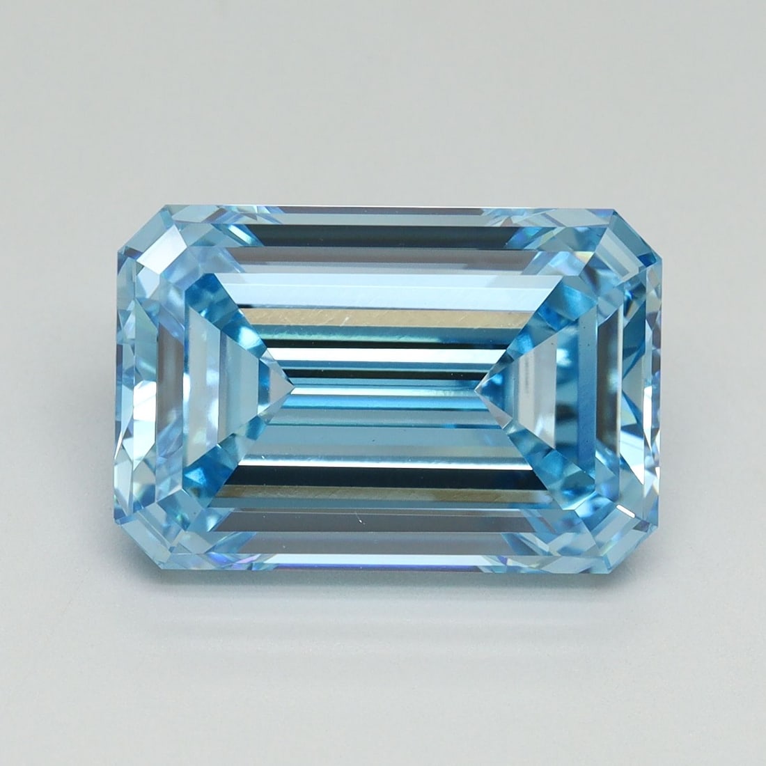 Loose Diamond - EMERALD 7.54ct Fancy Vivid Blue VS1: Loose Diamond - EMERALD 7.54ct Fancy Vivid Blue VS1 Source: This is a real non-mined Diamond that has been grown in a lab Shape: EMERALD Carats: 7.54 Color: Fancy Vivid Blue Certification: IGI Video: