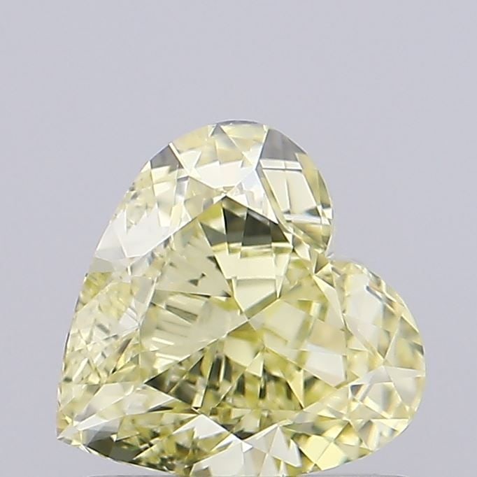 Loose Diamond - HEART 1.01ct Fancy Light Yellow VVS2: Loose Diamond - HEART 1.01ct Fancy Light Yellow VVS2 Source: This is a real non-mined Diamond that has been grown in a lab Shape: HEART Carats: 1.01 Color: Fancy Light Yellow Certification: IGI Video:
