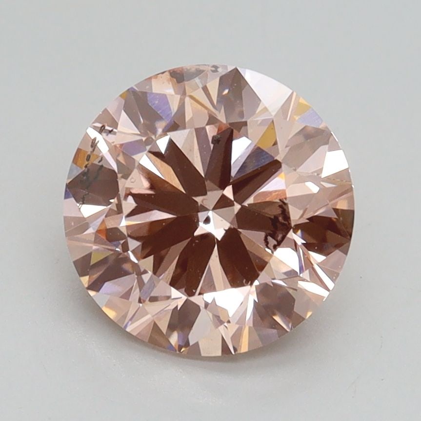Loose Diamond - ROUND 2.0ct Fancy Intense Pink SI2: Loose Diamond - ROUND 2.0ct Fancy Intense Pink SI2 Source: This is a real non-mined Diamond that has been grown in a lab Shape: ROUND Carats: 2.0 Color: Fancy Intense Pink Certification: IGI Video: