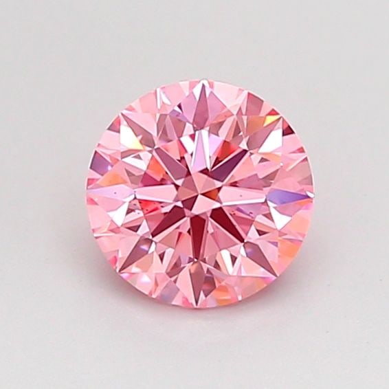 Ideal Loose Diamond - ROUND 0.65ct Fancy Vivid Pink VS2: Ideal Loose Diamond - ROUND 0.65ct Fancy Vivid Pink VS2 Source: This is a real non-mined Diamond that has been grown in a lab Shape: ROUND Carats: 0.65 Color: Fancy Vivid Pink Certification: IGI Video