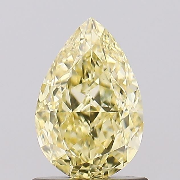 Loose Diamond - PEAR 1.01ct Fancy Yellow VS2: Loose Diamond - PEAR 1.01ct Fancy Yellow VS2 Source: This is a real non-mined Diamond that has been grown in a lab Shape: PEAR Carats: 1.01 Color: Fancy Yellow Certification: IGI Video: