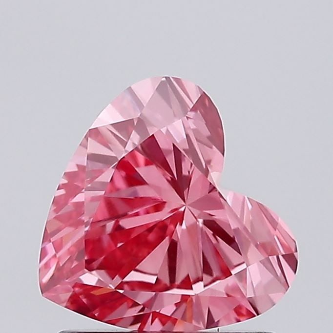 Loose Diamond - HEART 0.84ct Fancy Vivid Pink VVS2: Loose Diamond - HEART 0.84ct Fancy Vivid Pink VVS2 Source: This is a real non-mined Diamond that has been grown in a lab Shape: HEART Carats: 0.84 Color: Fancy Vivid Pink Certification: IGI Video: