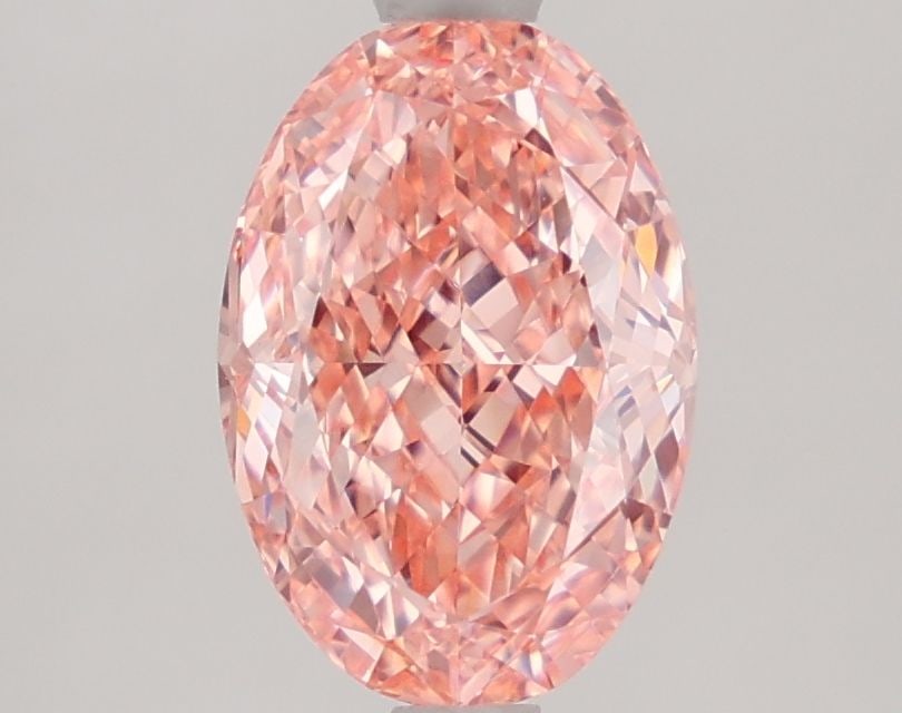 Loose Diamond - OVAL 2.11ct Fancy Vivid Pink VVS2: Loose Diamond - OVAL 2.11ct Fancy Vivid Pink VVS2 Source: This is a real non-mined Diamond that has been grown in a lab Shape: OVAL Carats: 2.11 Color: Fancy Vivid Pink Certification: IGI Video: