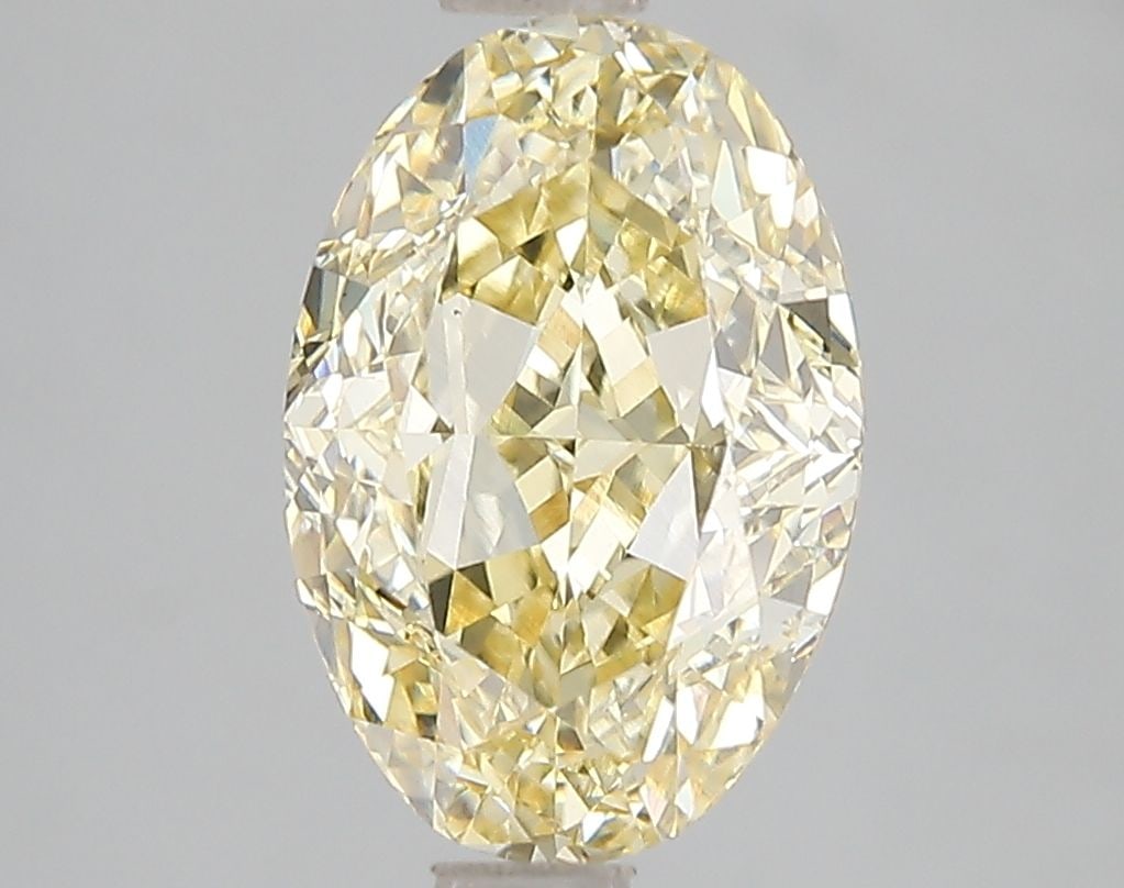 Loose Diamond - OVAL 3.08ct Fancy Intense Yellow VS1: Loose Diamond - OVAL 3.08ct Fancy Intense Yellow VS1 Source: This is a real non-mined Diamond that has been grown in a lab Shape: OVAL Carats: 3.08 Color: Fancy Intense Yellow Certification: IGI Video
