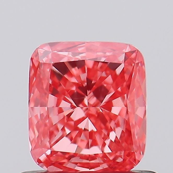Loose Diamond - CUSHION MODIFIED 0.71ct Fancy Pink VVS2: Loose Diamond - CUSHION MODIFIED 0.71ct Fancy Pink VVS2 Source: This is a real non-mined Diamond that has been grown in a lab Shape: CUSHION MODIFIED Carats: 0.71 Color: Fancy Pink Certification: IGI 