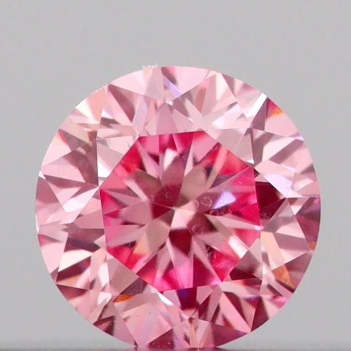 Loose Diamond - ROUND 0.14ct Fancy Vivid Pink VVS2: Loose Diamond - ROUND 0.14ct Fancy Vivid Pink VVS2 Source: This is a real non-mined Diamond that has been grown in a lab Shape: ROUND Carats: 0.14 Color: Fancy Vivid Pink Certification: IGI Video: