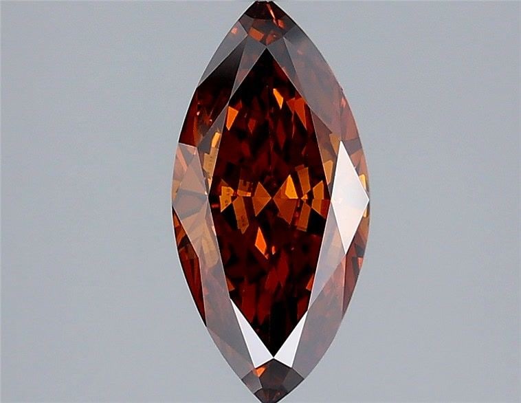Loose Diamond - MARQUISE 1.3ct Fancy Deep Orange VVS2: Loose Diamond - MARQUISE 1.3ct Fancy Deep Orange VVS2 Source: This is a real non-mined Diamond that has been grown in a lab Shape: MARQUISE Carats: 1.3 Color: Fancy Deep Orange Certification: IGI Vide