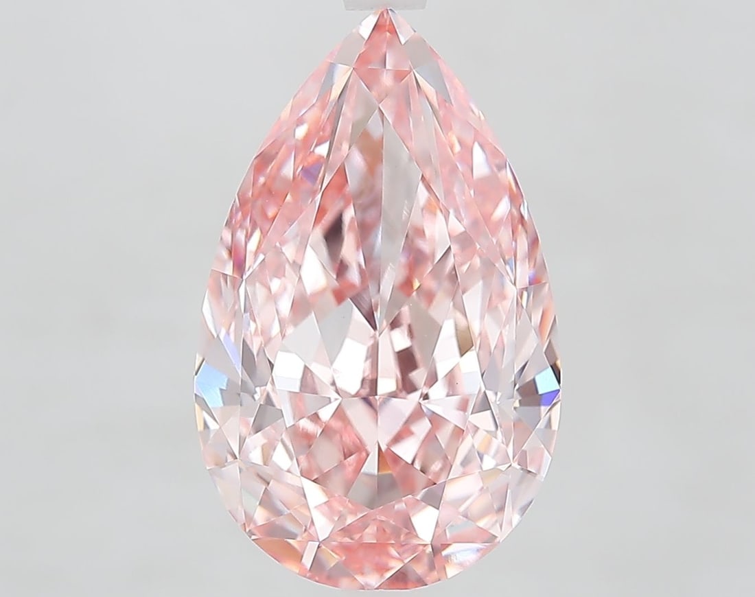 Loose Diamond - PEAR 7.1ct Fancy Vivid Pink VVS2: Loose Diamond - PEAR 7.1ct Fancy Vivid Pink VVS2 Source: This is a real non-mined Diamond that has been grown in a lab Shape: PEAR Carats: 7.1 Color: Fancy Vivid Pink Certification: IGI Video: Video