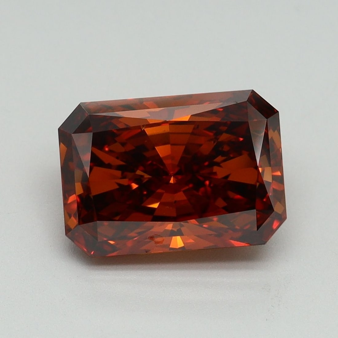 Loose Diamond - RADIANT 3.01ct Fancy Deep Orange VS2: Loose Diamond - RADIANT 3.01ct Fancy Deep Orange VS2 Source: This is a real non-mined Diamond that has been grown in a lab Shape: RADIANT Carats: 3.01 Color: Fancy Deep Orange Certification: IGI Video