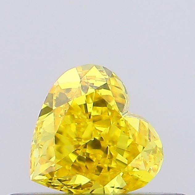 Loose Diamond - HEART 0.31ct Fancy Vivid Yellow VS1: Loose Diamond - HEART 0.31ct Fancy Vivid Yellow VS1 Source: This is a real non-mined Diamond that has been grown in a lab Shape: HEART Carats: 0.31 Color: Fancy Vivid Yellow Certification: NONE Video: