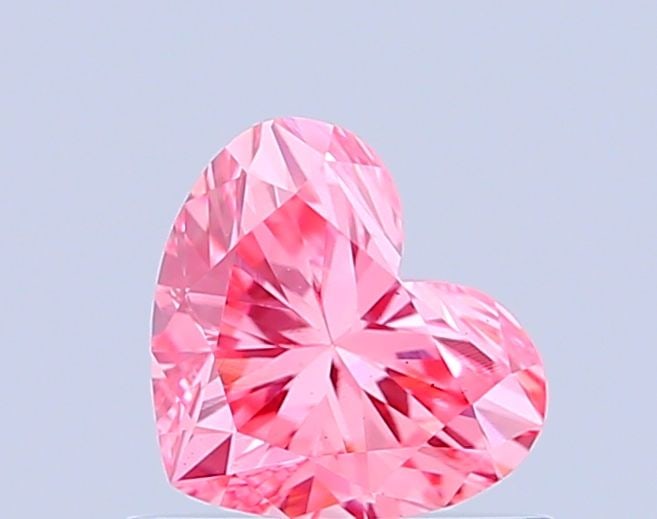 Loose Diamond - HEART 0.6ct Fancy Vivid Pink VS1: Loose Diamond - HEART 0.6ct Fancy Vivid Pink VS1 Source: This is a real non-mined Diamond that has been grown in a lab Shape: HEART Carats: 0.6 Color: Fancy Vivid Pink Certification: IGI Video: