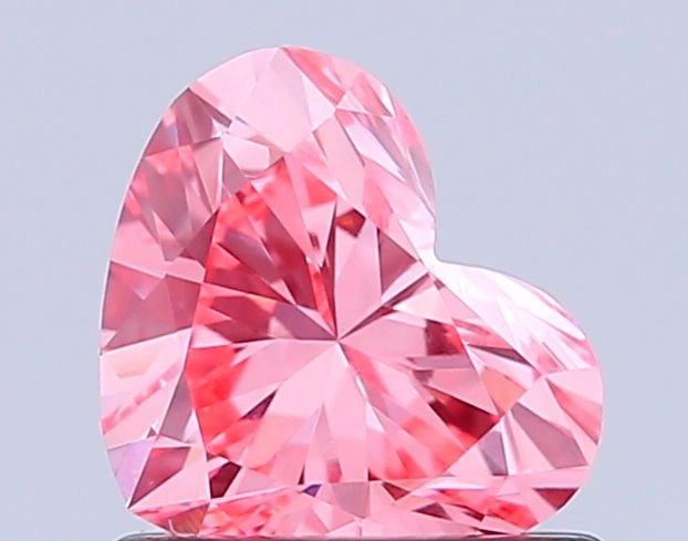 Loose Diamond - HEART 0.85ct Fancy Vivid Pink VS1: Loose Diamond - HEART 0.85ct Fancy Vivid Pink VS1 Source: This is a real non-mined Diamond that has been grown in a lab Shape: HEART Carats: 0.85 Color: Fancy Vivid Pink Certification: IGI Video: