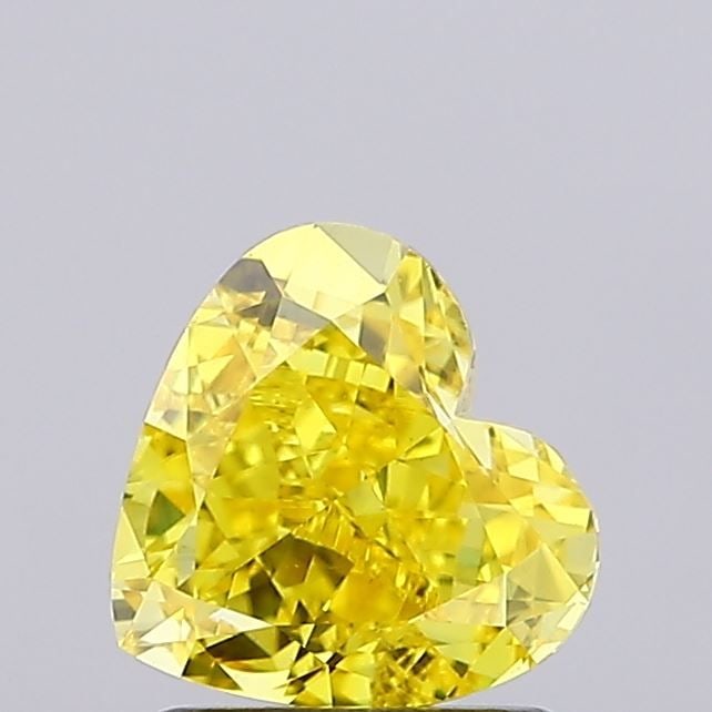 Loose Diamond - HEART 1.51ct Fancy Vivid Yellow VVS2: Loose Diamond - HEART 1.51ct Fancy Vivid Yellow VVS2 Source: This is a real non-mined Diamond that has been grown in a lab Shape: HEART Carats: 1.51 Color: Fancy Vivid Yellow Certification: NONE Video