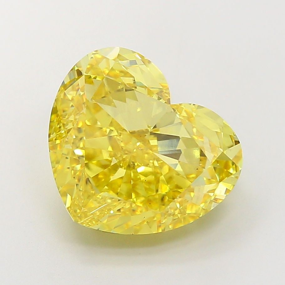 Loose Diamond - HEART 10.02ct Fancy Vivid Yellow VS2: Loose Diamond - HEART 10.02ct Fancy Vivid Yellow VS2 Source: This is a real non-mined Diamond that has been grown in a lab Shape: HEART Carats: 10.02 Color: Fancy Vivid Yellow Certification: IGI Video