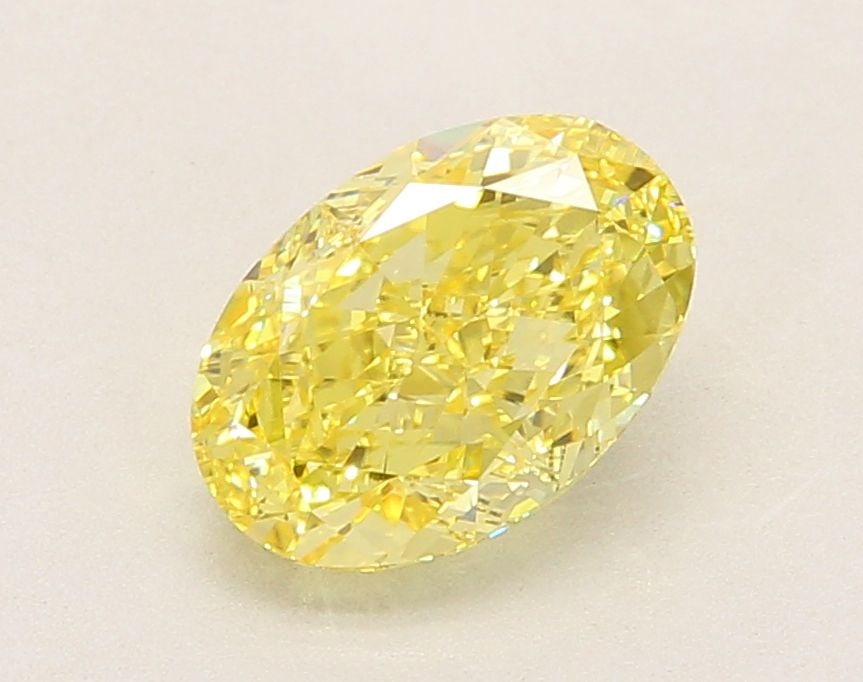 Loose Diamond - OVAL 2.21ct Fancy Intense Yellow VVS2: Loose Diamond - OVAL 2.21ct Fancy Intense Yellow VVS2 Source: This is a real non-mined Diamond that has been grown in a lab Shape: OVAL Carats: 2.21 Color: Fancy Intense Yellow Certification: IGI Vide
