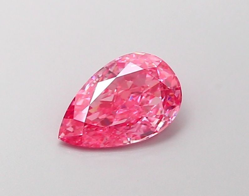 Loose Diamond - PEAR 1.0ct Fancy Vivid Pink VS1: Loose Diamond - PEAR 1.0ct Fancy Vivid Pink VS1 Source: This is a real non-mined Diamond that has been grown in a lab Shape: PEAR Carats: 1.0 Color: Fancy Vivid Pink Certification: IGI Video: