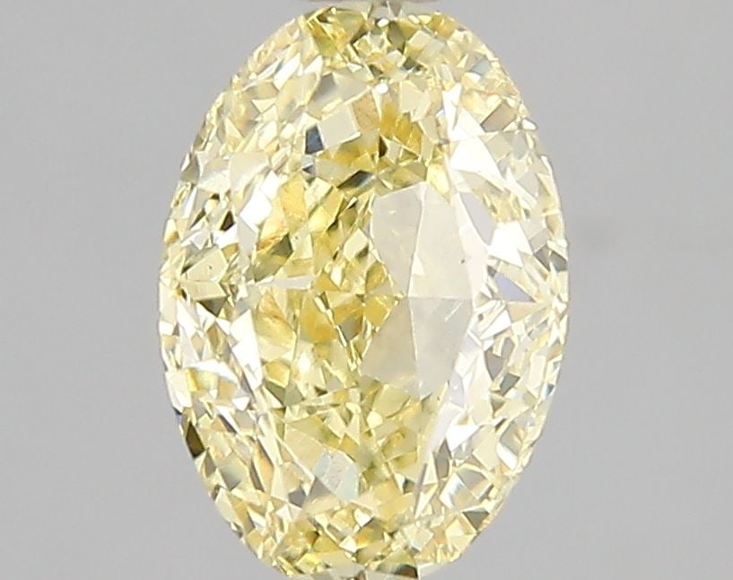 Loose Diamond - OVAL 2.01ct Fancy Vivid Yellow VS1: Loose Diamond - OVAL 2.01ct Fancy Vivid Yellow VS1 Source: This is a real non-mined Diamond that has been grown in a lab Shape: OVAL Carats: 2.01 Color: Fancy Vivid Yellow Certification: IGI Video: