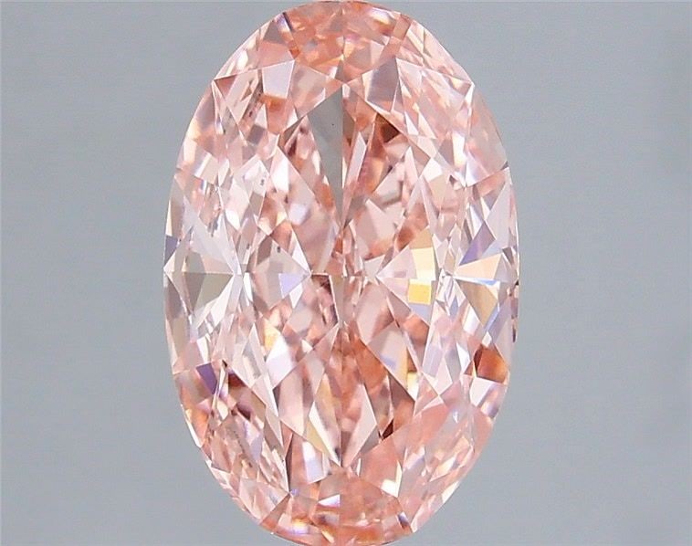 Loose Diamond - OVAL 3.0ct Fancy Vivid Pink VVS2: Loose Diamond - OVAL 3.0ct Fancy Vivid Pink VVS2 Source: This is a real non-mined Diamond that has been grown in a lab Shape: OVAL Carats: 3.0 Color: Fancy Vivid Pink Certification: IGI Video: