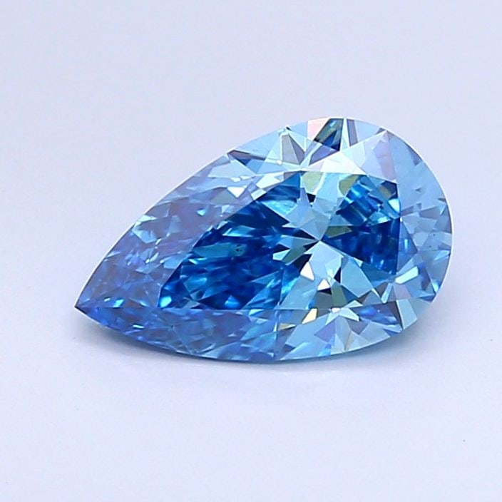 Loose Diamond - PEAR 1.0ct Fancy Vivid Blue VVS2: Loose Diamond - PEAR 1.0ct Fancy Vivid Blue VVS2 Source: This is a real non-mined Diamond that has been grown in a lab Shape: PEAR Carats: 1.0 Color: Fancy Vivid Blue Certification: IGI Video: