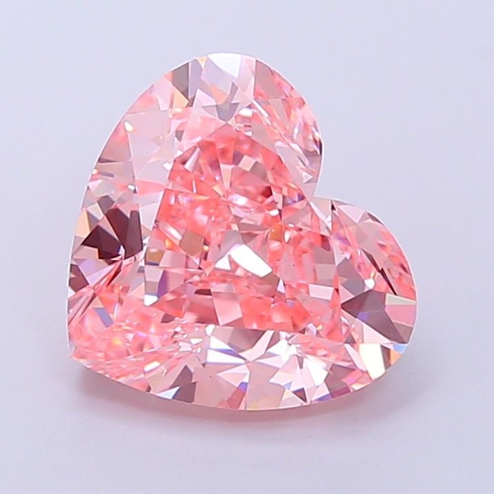 Loose Diamond - HEART 3.41ct Fancy Vivid Pink VVS2: Loose Diamond - HEART 3.41ct Fancy Vivid Pink VVS2 Source: This is a real non-mined Diamond that has been grown in a lab Shape: HEART Carats: 3.41 Color: Fancy Vivid Pink Certification: IGI Video: