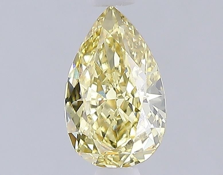 Loose Diamond - PEAR 1.0ct Fancy Yellow VS1: Loose Diamond - PEAR 1.0ct Fancy Yellow VS1 Source: This is a real non-mined Diamond that has been grown in a lab Shape: PEAR Carats: 1.0 Color: Fancy Yellow Certification: IGI Video:
