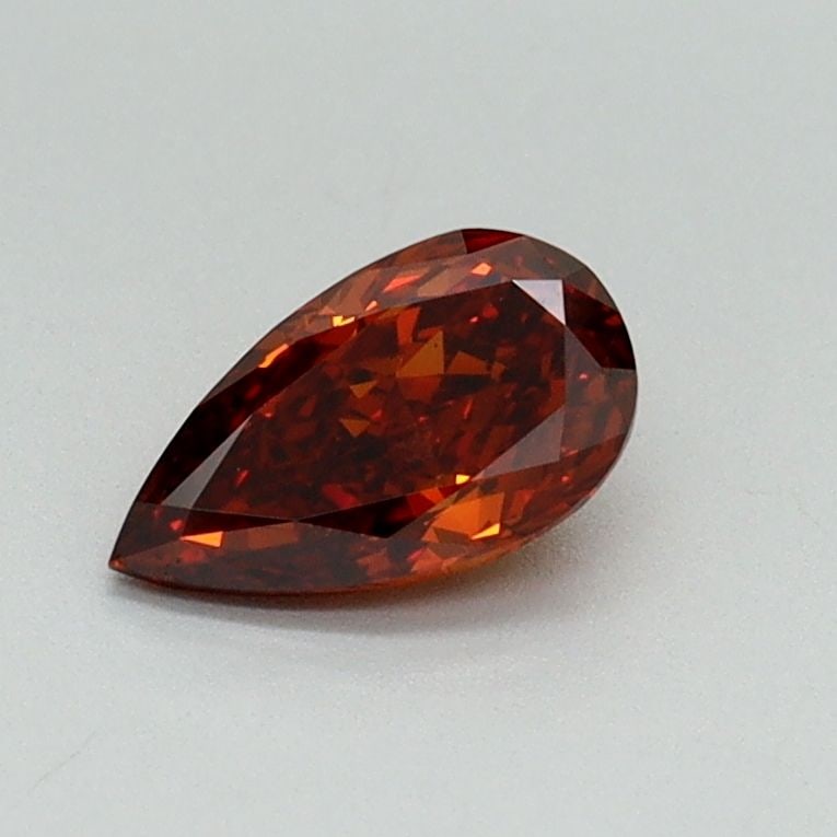 Loose Diamond - PEAR 0.51ct Fancy Vivid Orange VS2: Loose Diamond - PEAR 0.51ct Fancy Vivid Orange VS2 Source: This is a real non-mined Diamond that has been grown in a lab Shape: PEAR Carats: 0.51 Color: Fancy Vivid Orange Certification: IGI Video: