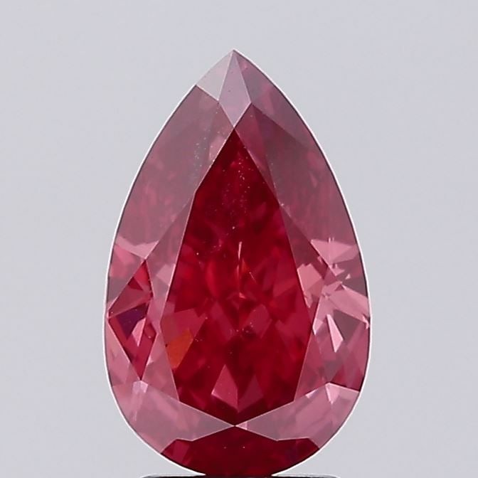 Loose Diamond - PEAR 3.29ct Fancy Vivid Pink VVS2: Loose Diamond - PEAR 3.29ct Fancy Vivid Pink VVS2 Source: This is a real non-mined Diamond that has been grown in a lab Shape: PEAR Carats: 3.29 Color: Fancy Vivid Pink Certification: IGI Video: