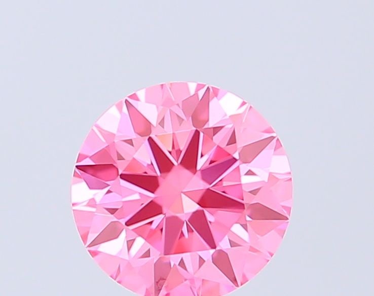 Loose Diamond - ROUND 0.55ct Fancy Vivid Pink VVS2: Loose Diamond - ROUND 0.55ct Fancy Vivid Pink VVS2 Source: This is a real non-mined Diamond that has been grown in a lab Shape: ROUND Carats: 0.55 Color: Fancy Vivid Pink Certification: IGI Video: