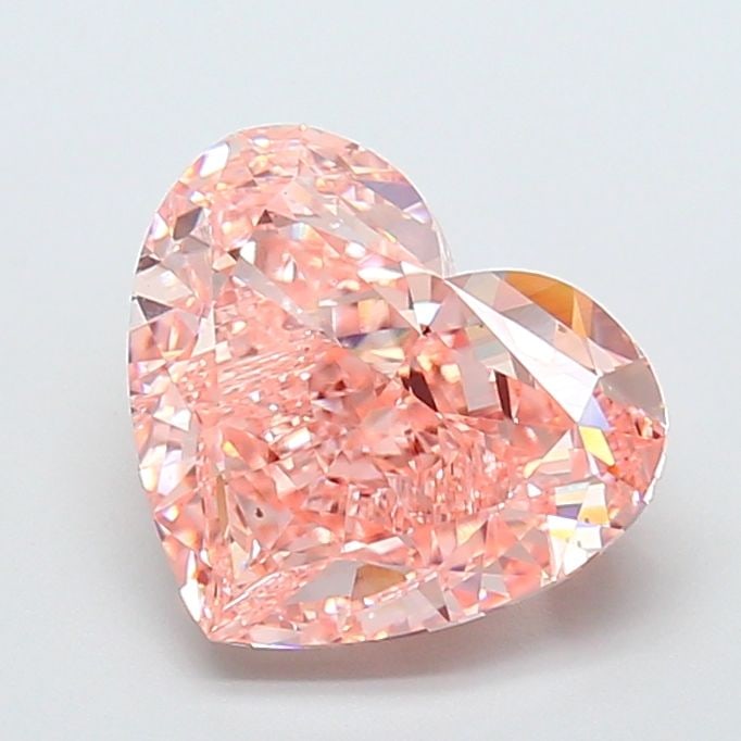 Loose Diamond - HEART 5.03ct Fancy Vivid Pink VVS2: Loose Diamond - HEART 5.03ct Fancy Vivid Pink VVS2 Source: This is a real non-mined Diamond that has been grown in a lab Shape: HEART Carats: 5.03 Color: Fancy Vivid Pink Certification: IGI Video: