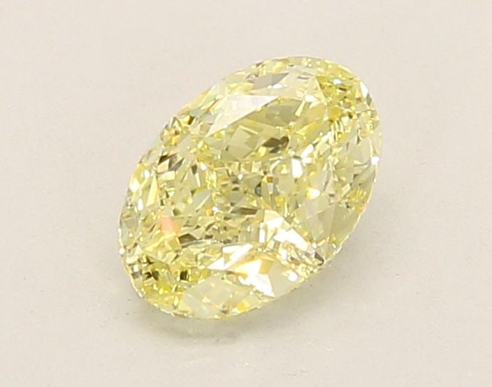 Loose Diamond - OVAL 1.04ct Fancy Yellow VS1: Loose Diamond - OVAL 1.04ct Fancy Yellow VS1 Source: This is a real non-mined Diamond that has been grown in a lab Shape: OVAL Carats: 1.04 Color: Fancy Yellow Certification: IGI Video:
