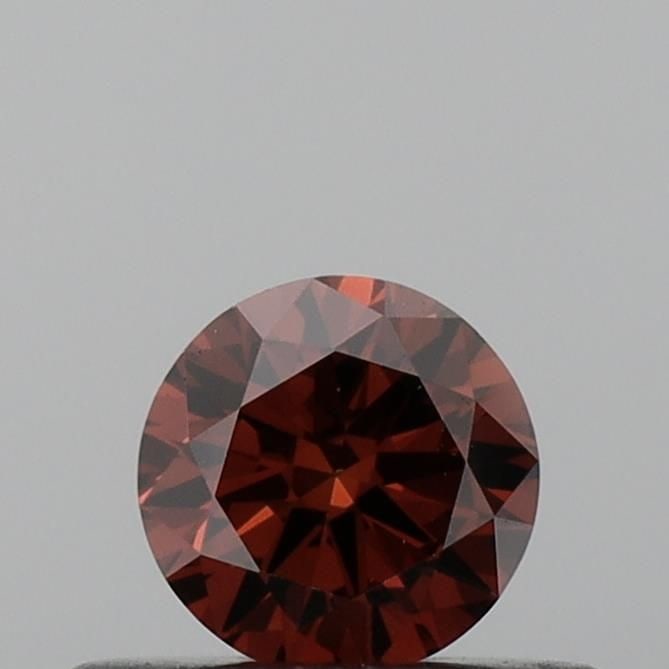 Loose Diamond - ROUND 0.3ct Fancy Deep Orange VVS2: Loose Diamond - ROUND 0.3ct Fancy Deep Orange VVS2 Source: This is a real non-mined Diamond that has been grown in a lab Shape: ROUND Carats: 0.3 Color: Fancy Deep Orange Certification: IGI Video: