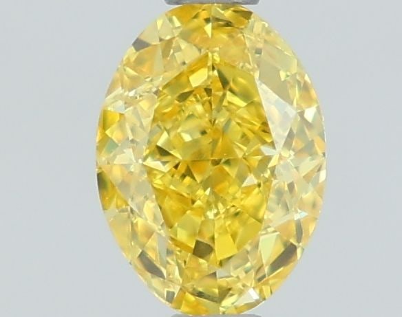Loose Diamond - OVAL 1.02ct Fancy Vivid Yellow VS1: Loose Diamond - OVAL 1.02ct Fancy Vivid Yellow VS1 Source: This is a real non-mined Diamond that has been grown in a lab Shape: OVAL Carats: 1.02 Color: Fancy Vivid Yellow Certification: IGI Video:
