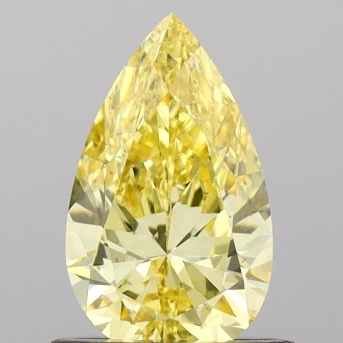 Loose Diamond - PEAR 0.78ct Fancy Vivid Yellow VS2: Loose Diamond - PEAR 0.78ct Fancy Vivid Yellow VS2 Source: This is a real non-mined Diamond that has been grown in a lab Shape: PEAR Carats: 0.78 Color: Fancy Vivid Yellow Certification: IGI Video: