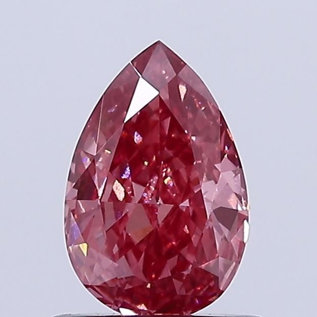 Loose Diamond - PEAR 0.75ct Fancy Vivid Pink VS1: Loose Diamond - PEAR 0.75ct Fancy Vivid Pink VS1 Source: This is a real non-mined Diamond that has been grown in a lab Shape: PEAR Carats: 0.75 Color: Fancy Vivid Pink Certification: IGI Video: